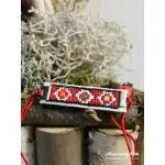 Martenitsa for hand with solid embroidery